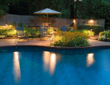 pool lighting with landscape features