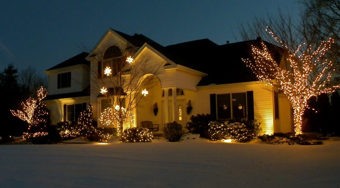 house with lights professionally decorated