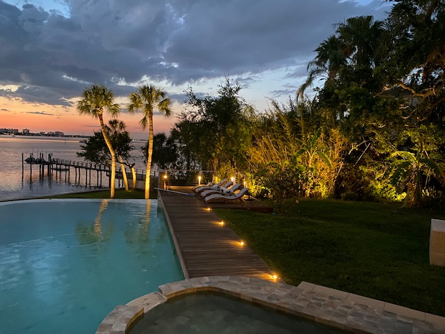 lighting along landscaping and pool