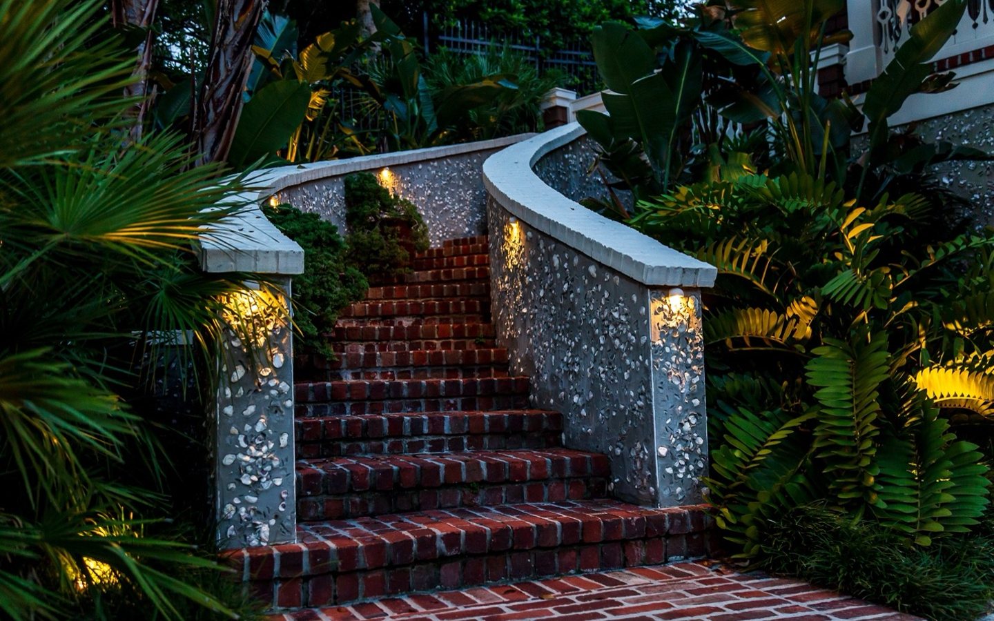 A staircase leading to a house

Description automatically generated