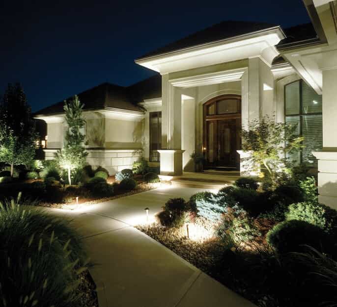 Home with landscape lighting