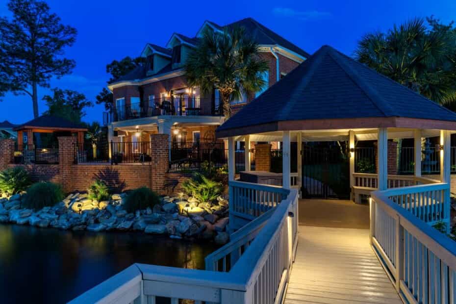 Backyard dock and patio with lighting