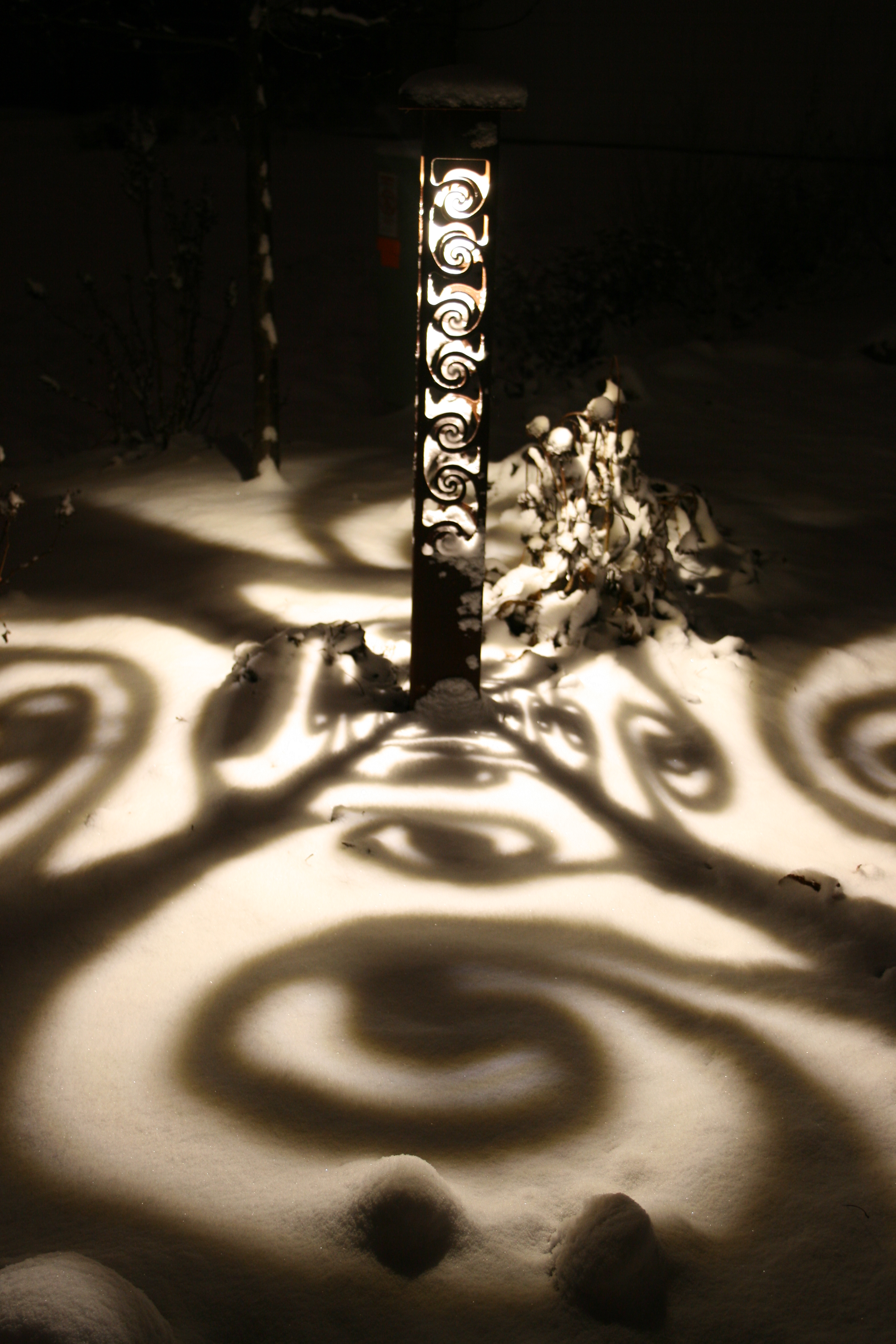 bollard shadows lighting in snow 