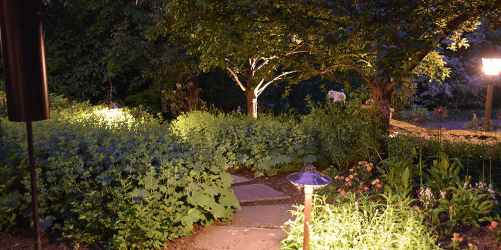 Owning Mills home with landscape lighting