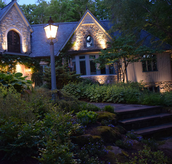 Home with special lighting in the front yard