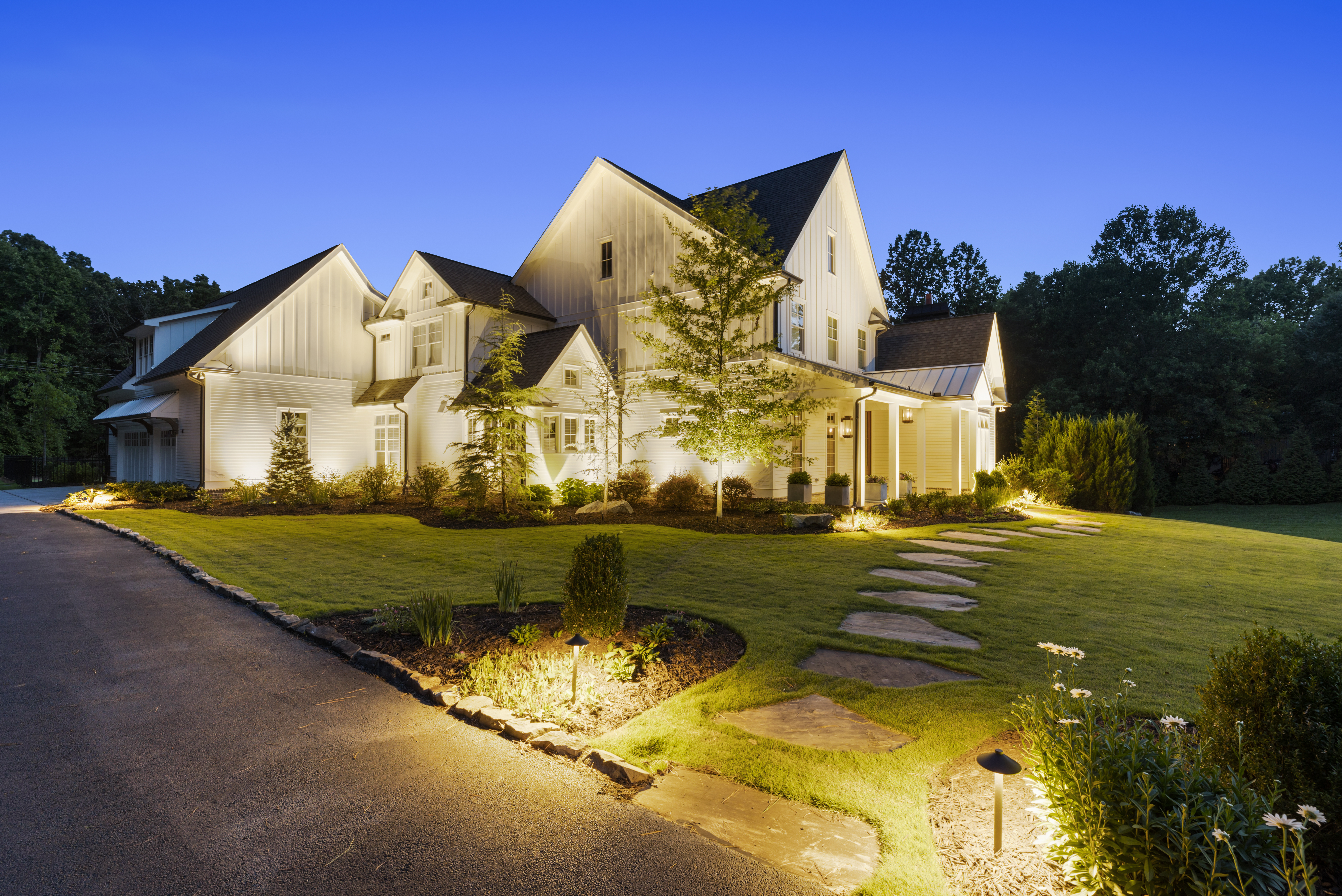 Photo of a home with pathway lights