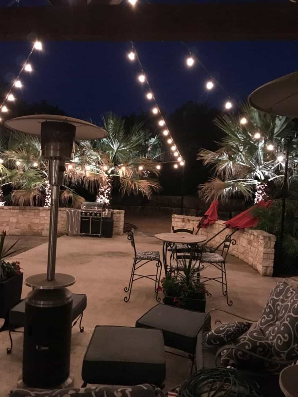 residential back yard with string lighting