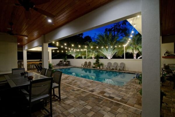Backyard pool lighting by Outdoor Lighting Perspectives