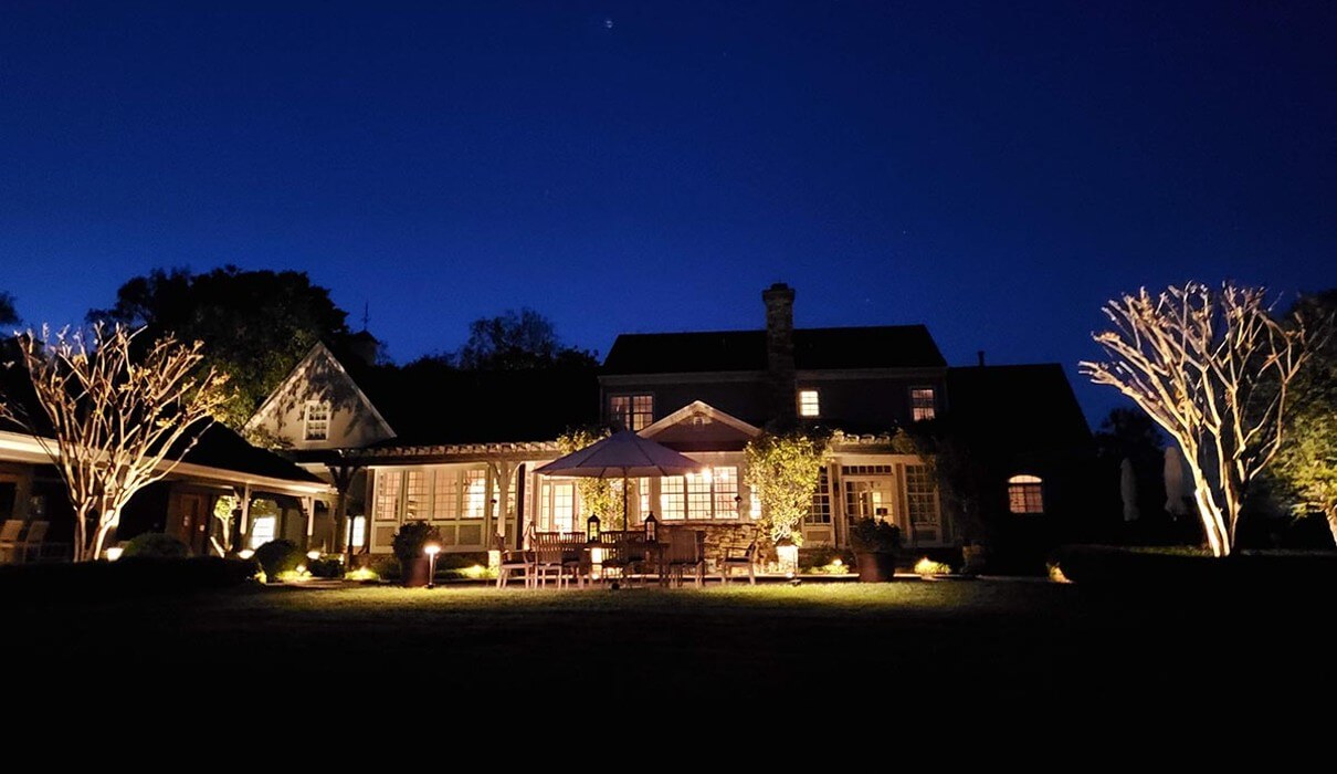 Home with outdoor lighting