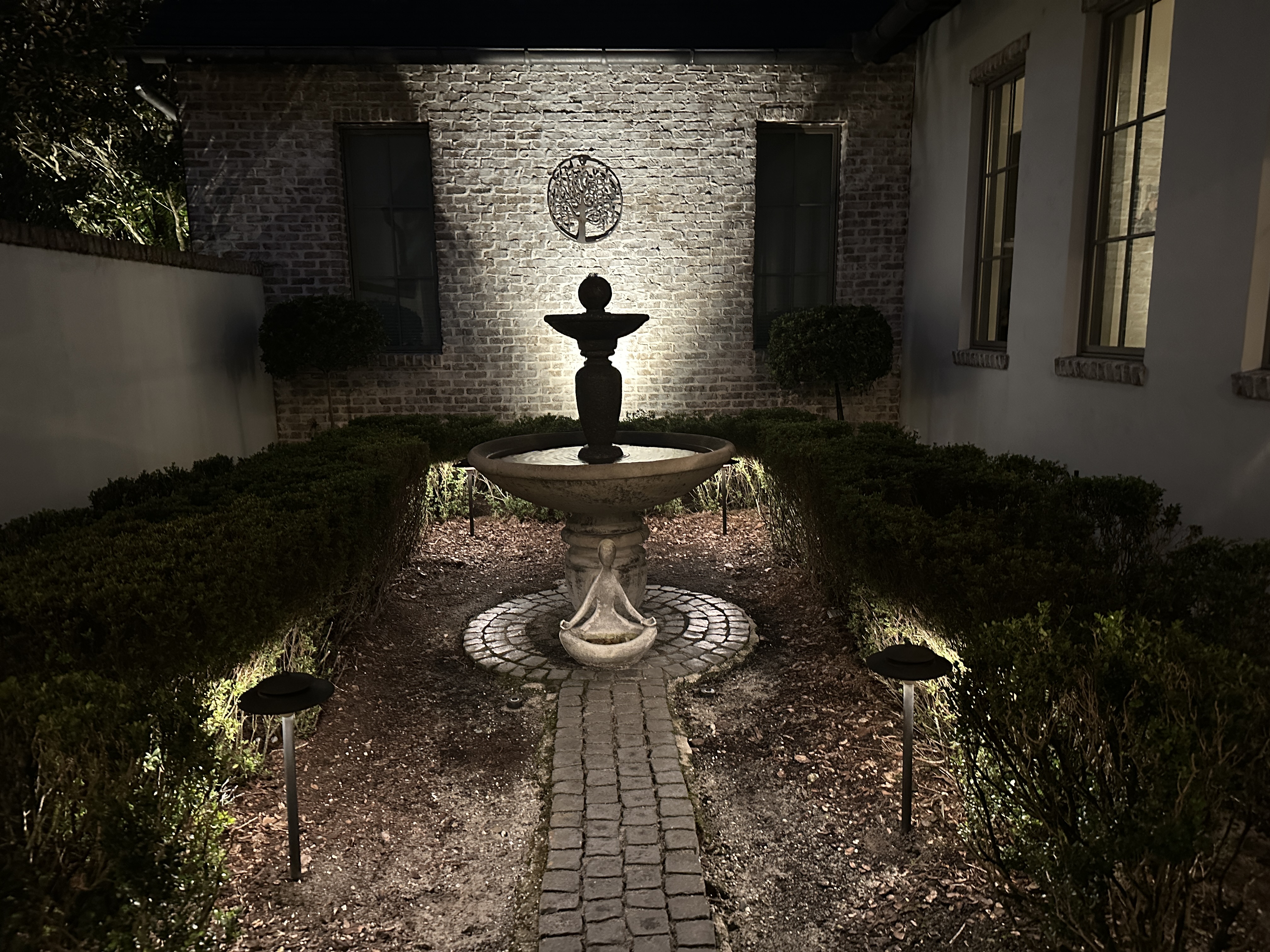 outdoor fountain lit up