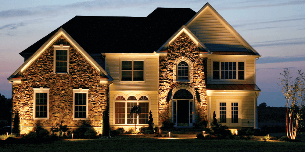 Home with landscape lighting