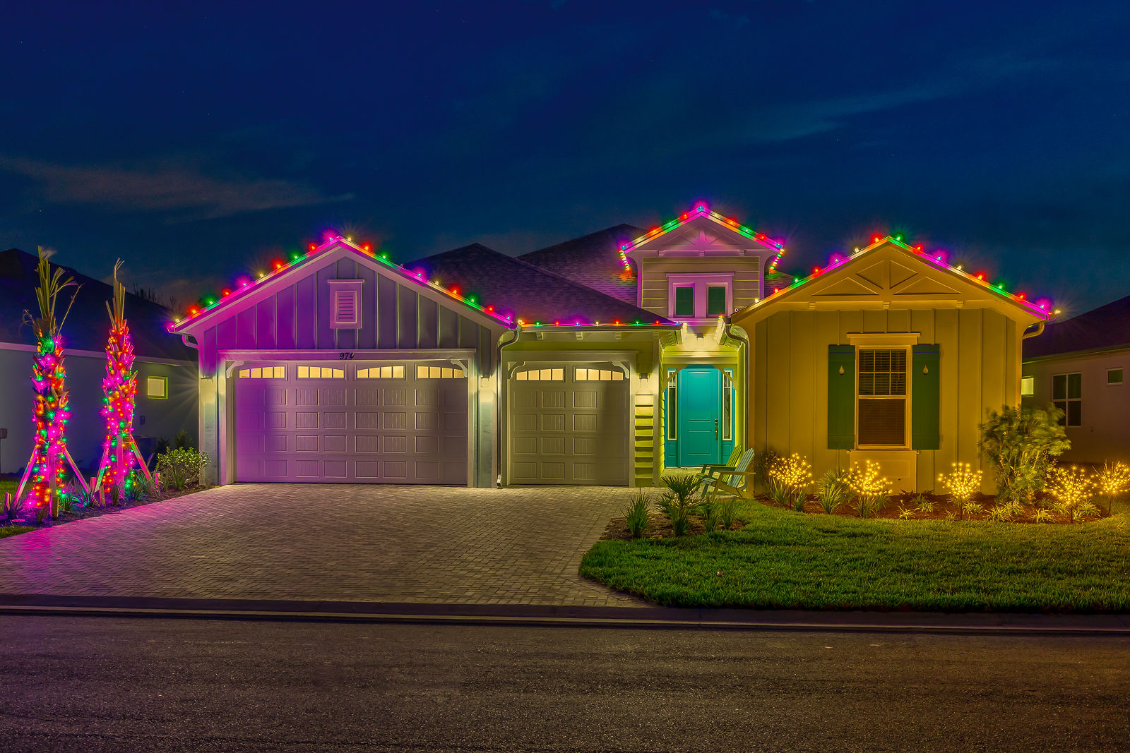home with colorful christmas lights