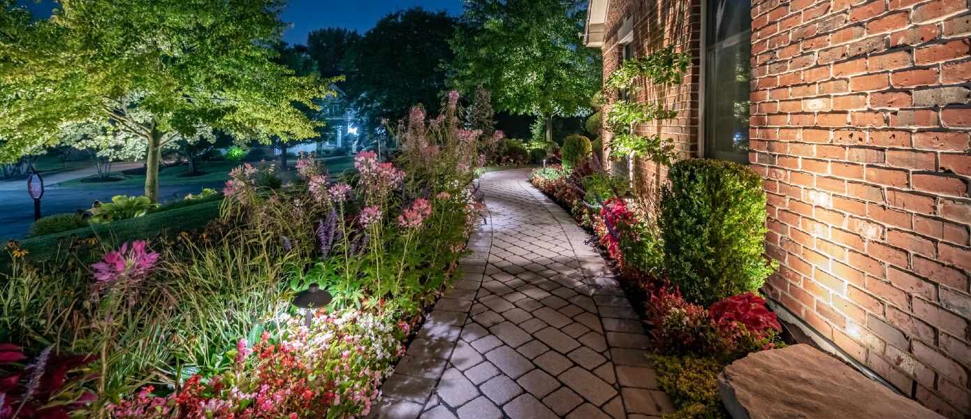 Pathway lighting along a brick walkway