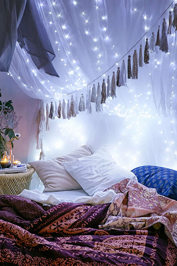 string lights over a canopy creates a dreamlike environment.
